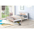 Lit plateforme double en bois avec tête de lit à motif en arc pour chambre d'enfant